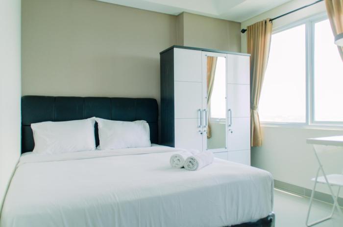 Minimalist and Cozy Living Studio Apartment at B Residence By Travelio