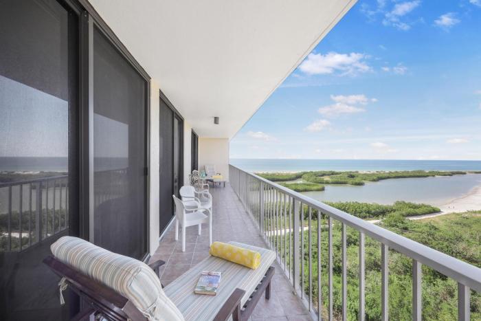 Beachfront condo with pool and ocean view from balcony