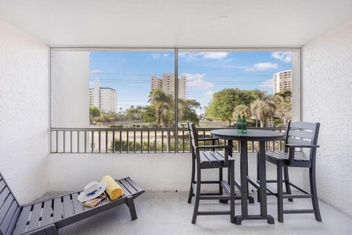 Relaxing inland condo with pool and steps to beach