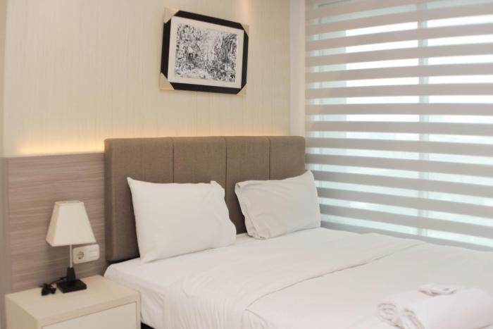 Comfort 2BR at Grand Kamala Lagoon Apartment By Travelio