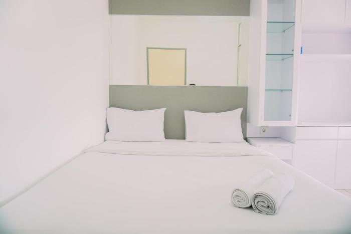 Scenic and Homey 2BR Apartment M-Town Residence near Mall By Travelio