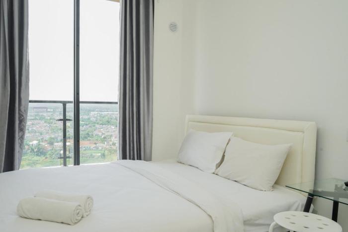 Elegant and Homey Studio at Sky House BSD Apartment By Travelio