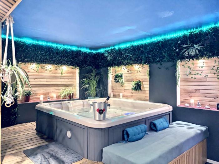 Lalcôve du 510 - Spa - chambre romantique - sauna - salle de jeux