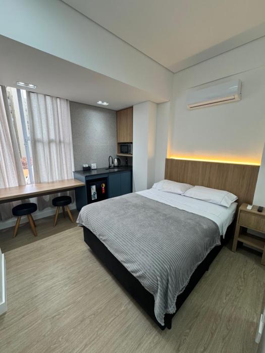 Studio no centro, confortável e prático