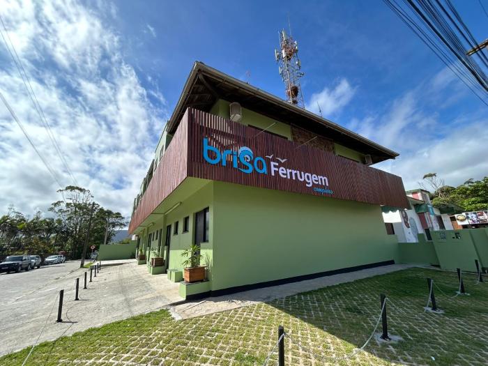 Brisa Ferrugem apenas uma quadra da Praia da Ferrugem e Bar do Zado