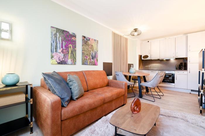 Das Solaris 3 Beach Apartment mit Balkon, Gemeinschaftssauna und Grillplatz