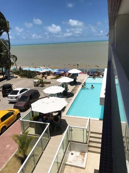 Apt pé na areia do Caribessa com piscina