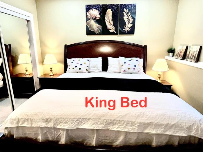 Cozy Walkout suite with King bed, Kitchen, Parking & Patio