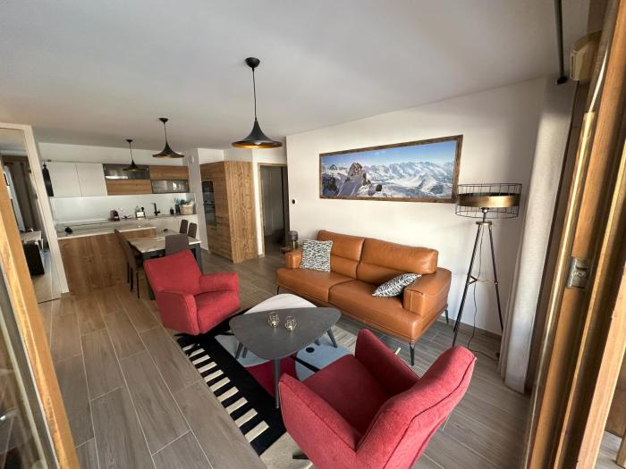 Apprt moderne 70m2, 3 chbr, 6 pers, sur les pistes, tout équipé, garage intérieur