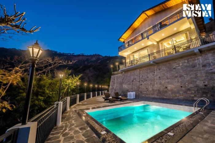 StayVista at Sunset Springs with Heated Swimming Pool