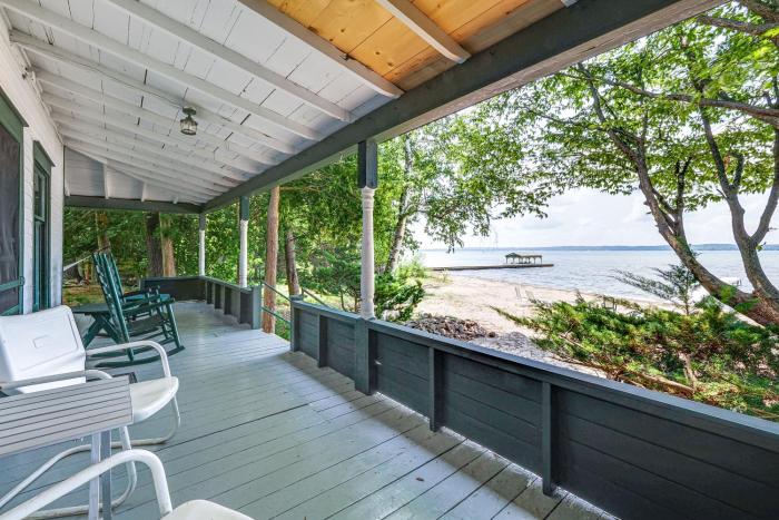 Torch Lake Getaway with Private Beach and Boat Dock!