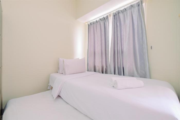 Modern Look Studio at Taman Melati Margonda Apartment By Travelio