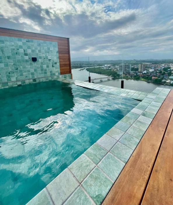 Apartamento novo com vista para o mar e rio