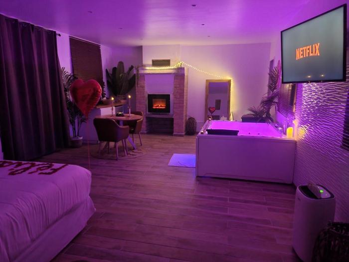 Evasion Romantique love room jacuzzi jardin privé près de Paris
