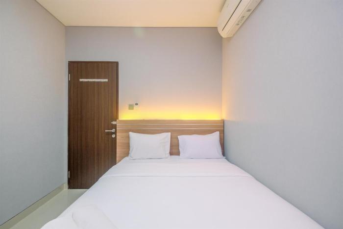 Fully Furnished with Cozy Design 2BR Apartment Transpark Cibubur By Travelio