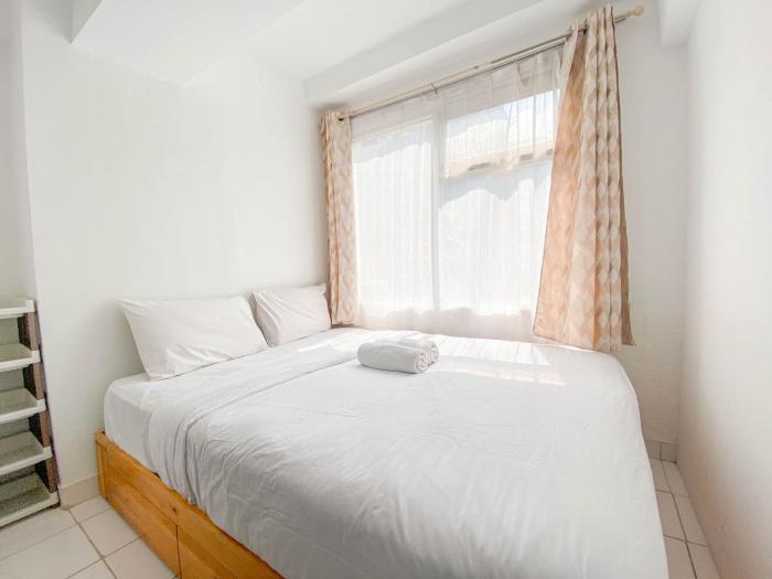 Simply 2BR at Jarrdin Cihampelas Apartment By Travelio