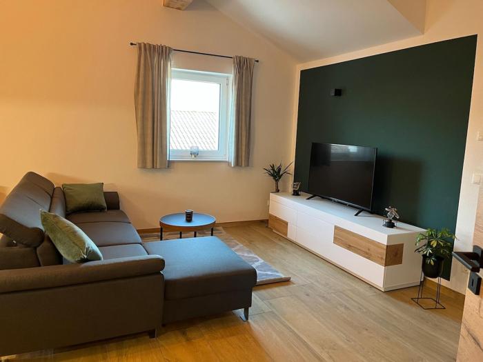 Neue moderne Ferienwohnung mit Infrarot Sauna und großen Garten