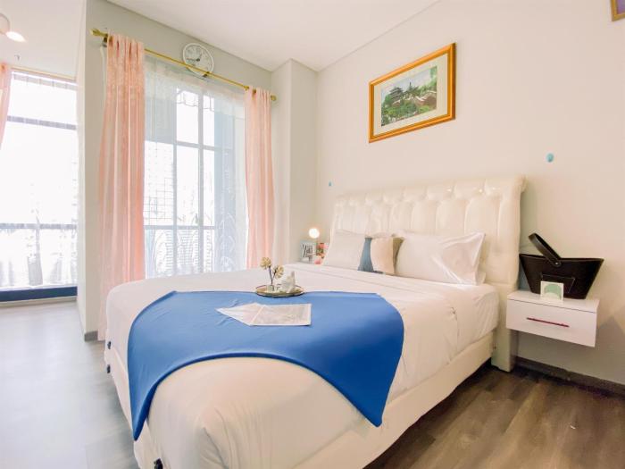 Good and Simply 1BR at Sudirman Suites Apartment By Travelio