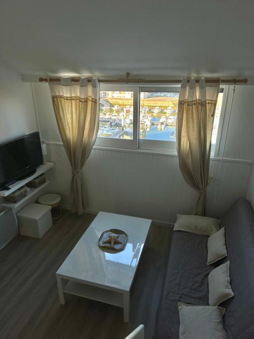 Aux beaux coquillages, vue mer et sur le port