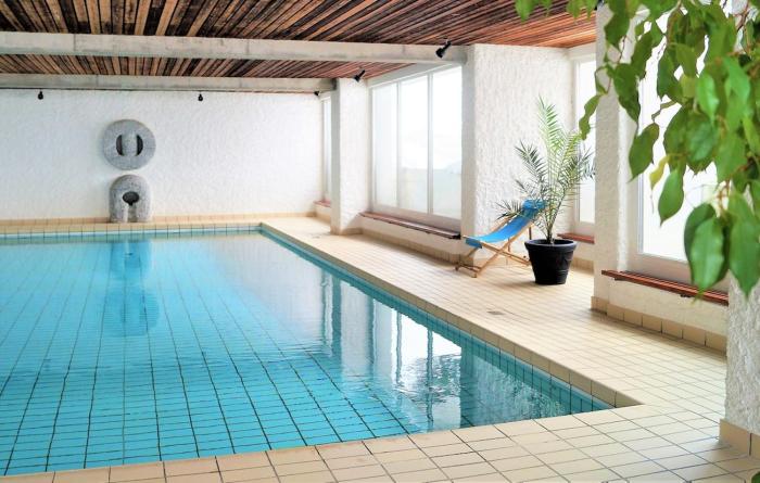 60 m2 Wohnung mit Hallenbad und Sauna