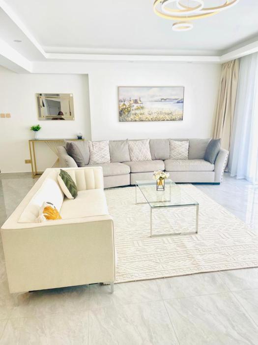 executive vibrant view three bedroom apartment with swimming pool,mordern equipped gym free parking space and, child play area and comforting rooftop with city views