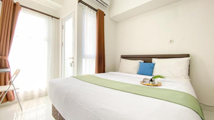 Best Deal and Restful Studio at Amazana Serpong Apartment By Travelio