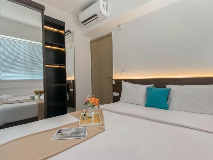 Homey and Modern Look 3BR at Meikarta with Balcon Apartment By Travelio