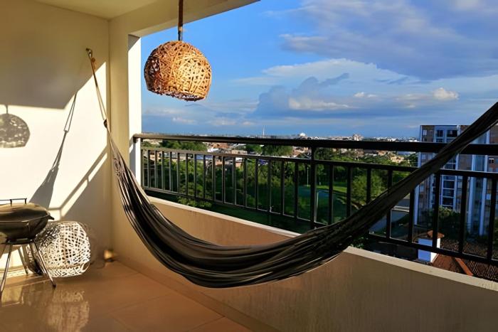 Apartamento con aire, hamaca, piscina y gym