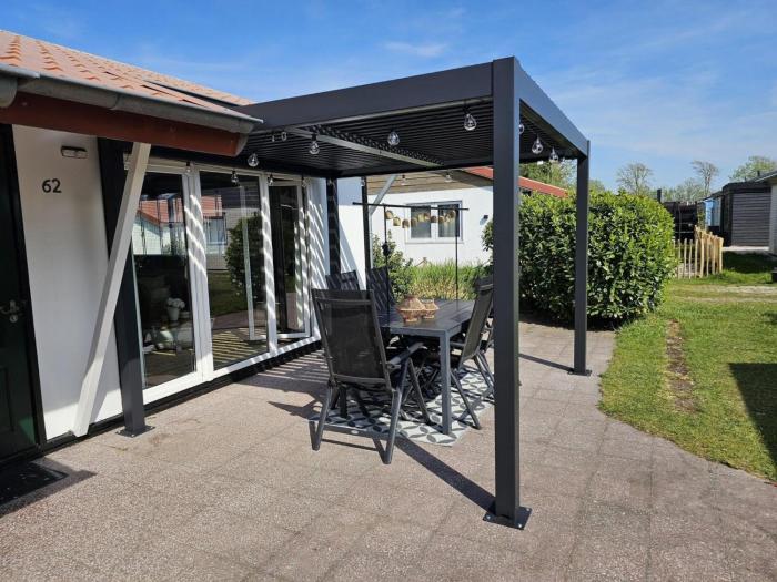 Bungalow in park with fenced garden
