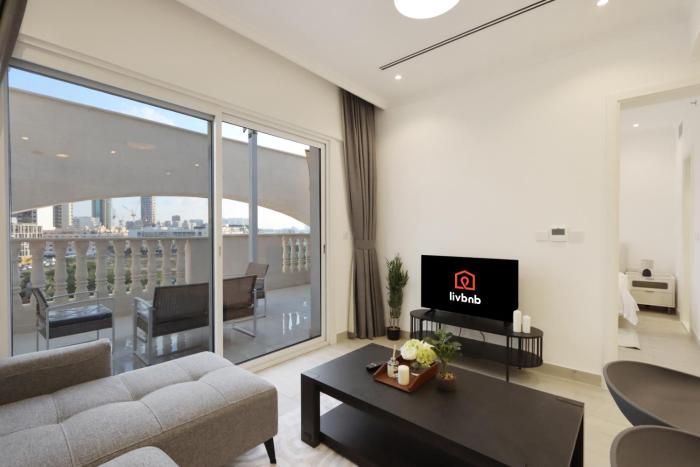 Livbnb-Modern 1BR Oasis with Stunning Terrace, JVC