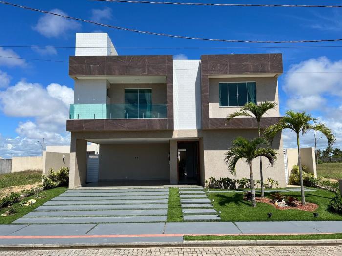 Mansão de luxo em condômino pé na areia