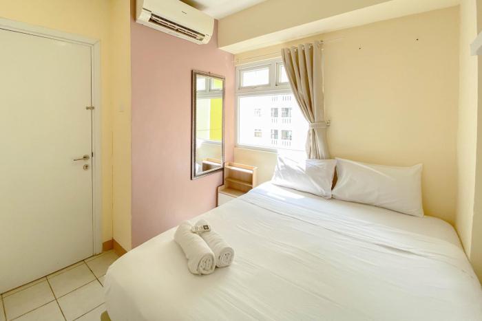 Good Deal and Well Design 2BR Green Pramuka City Apartment By Travelio