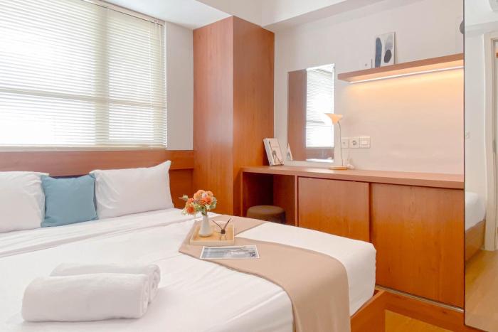 Well Designed 2BR Meikarta Apartment By Travelio