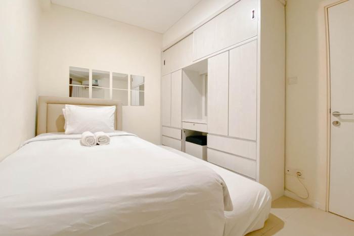 1BR with Direct Access to Pool at Parahyangan Residence Apartment By Travelio