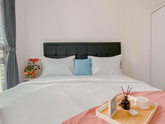 Brand New and Homey 2BR Apartment at Woodland Park Residence By Travelio