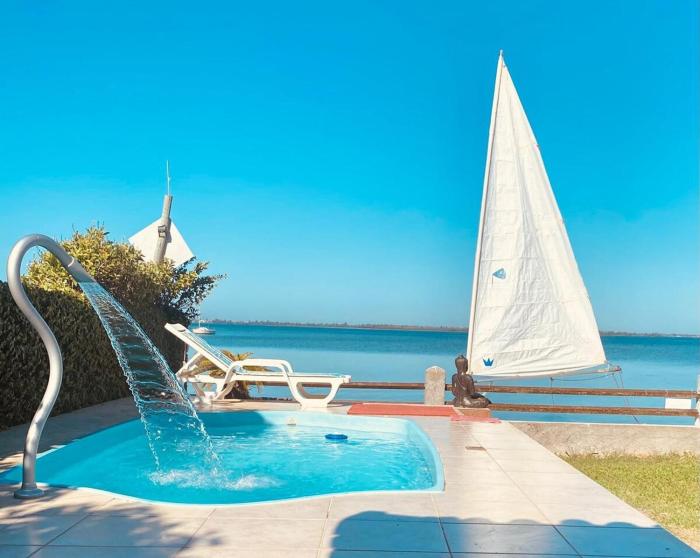 Pé na Areia Budha House