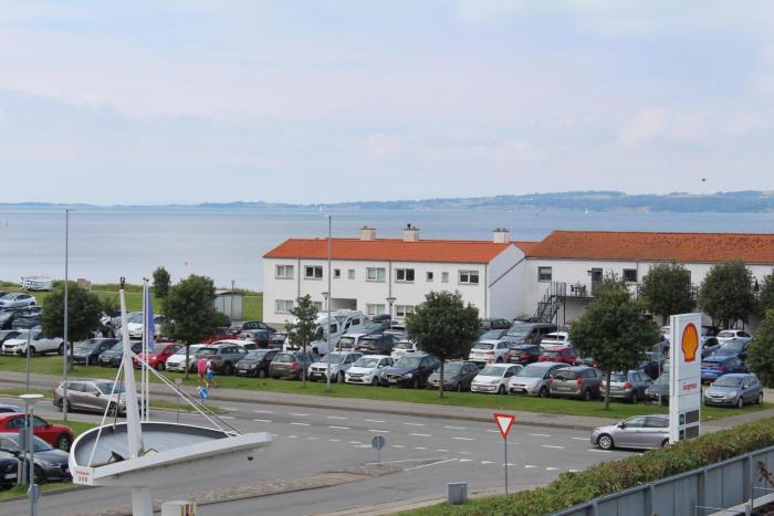 Lovely And Spacious Two-Level Apartment With Balcony, Elevator And Private Parking Just Steps From Ebeltofts Charming Pedestrian Streets, Cafés,