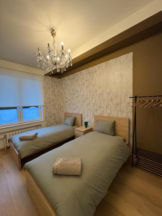 2 Chambres-balcon-salle de bain