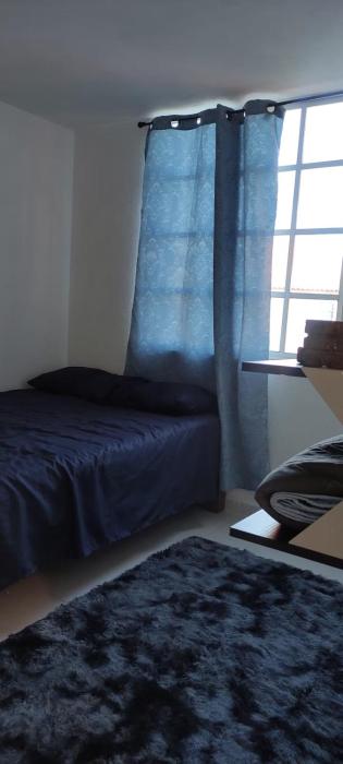 Cómoda recamara privada en Departamento segunda planta