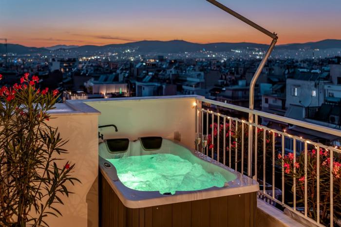 Rooftops of Athens - Vathi Studio Jacuzzi & View