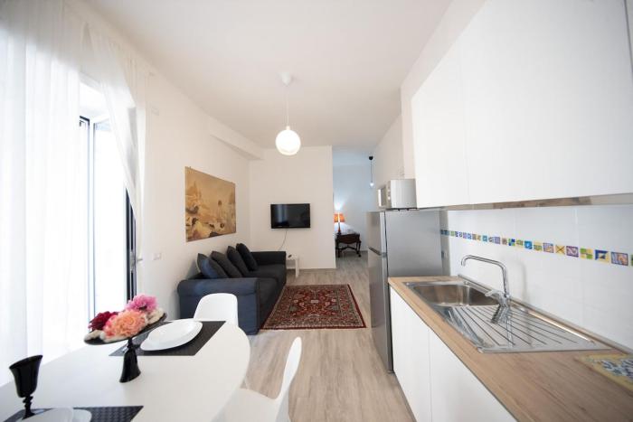 SweetHome Confortevole bilocale vicino Stazione Aria Condizionata Wifi