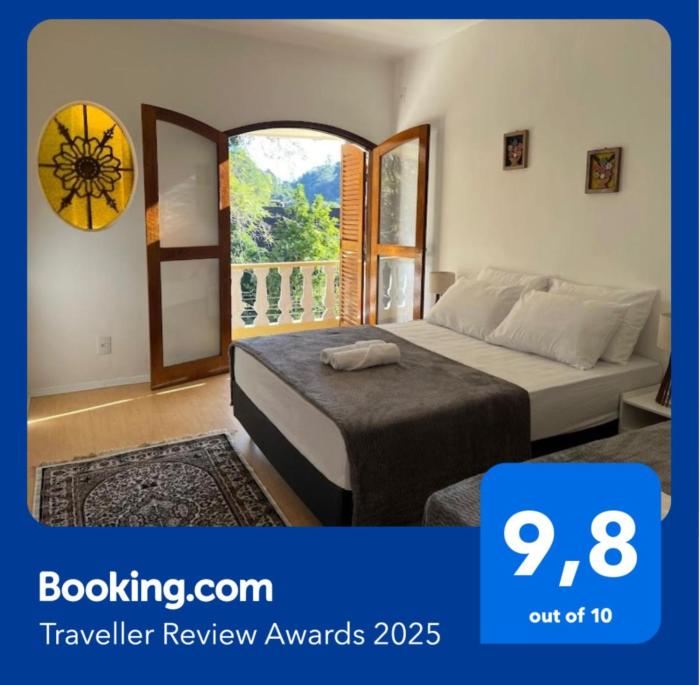 Suíte Romântica premiada com linda vista de varanda em Petrópolis!