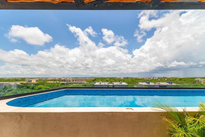 2 BR with Direct Walk-out to Pool, Sauna, and Gym