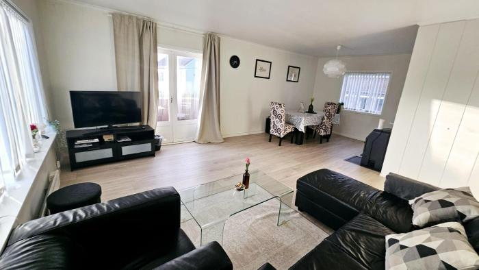 Koselig leilighet med balkong og parkering.