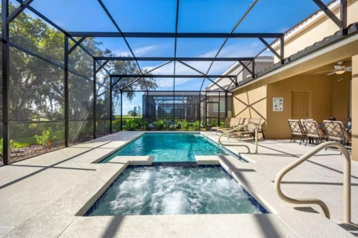 5 Bed ,South facing pool home, great amenities.