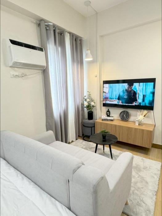 The Nialls Suites at HOPE Residences besides SM TRECE