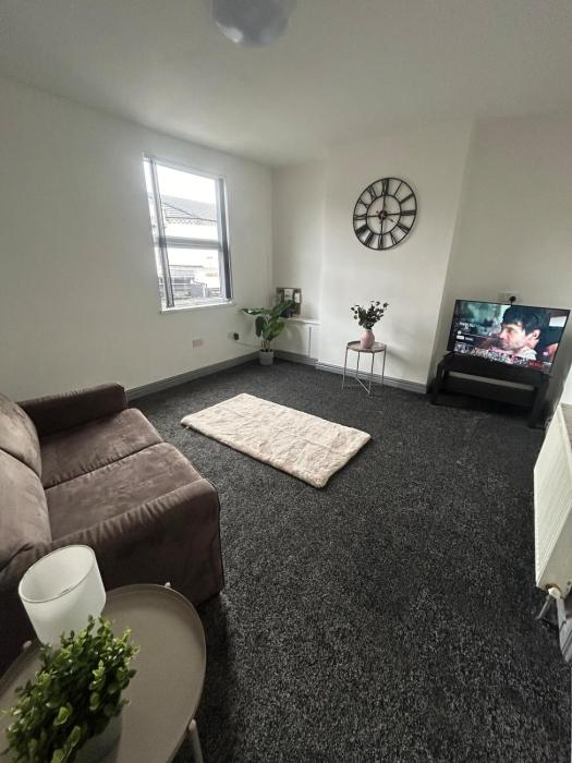 Spacious Apartment near train station with a parking space