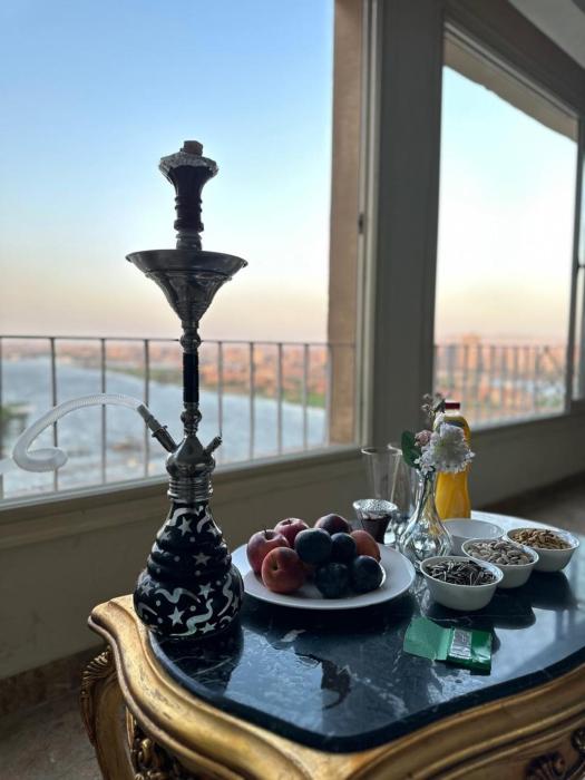 برج نايل كينج علي النيل شارع البحر الأعظم