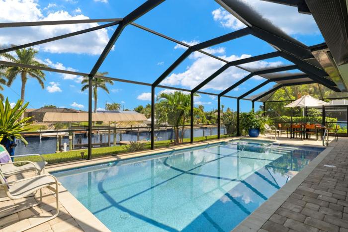 Villa Paradise Cove - NEW LISTING! Elec-Heated Pool wspa on Gulf Access w dock - SWFL Rentals