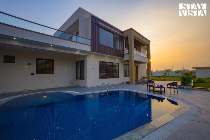 StayVista at Lush Haven with Pool, AC